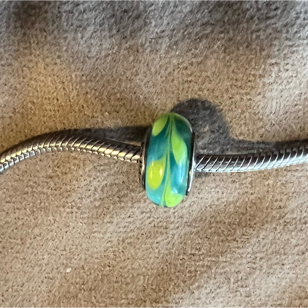 Beautiful Pandora Green and aqua swirl Murano glass charm.